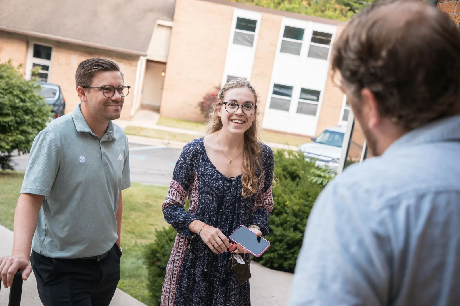 A conversation on the chapel lawn